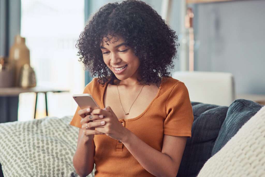 woman using patient appointment self scheduling on smart phone