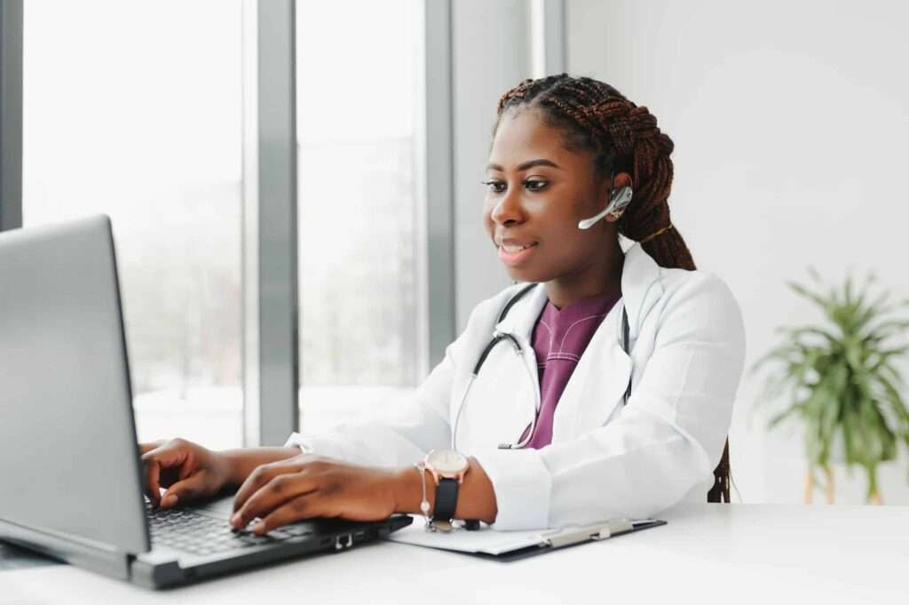 Doctor using medical appointment scheduling software for Patient Outreach