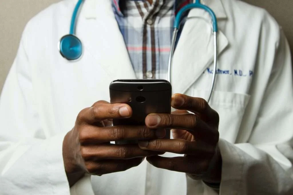 MD using Hospital Chat on mobile phone