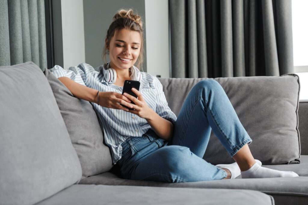 Image of smiling nice woman using medical scheduling platform