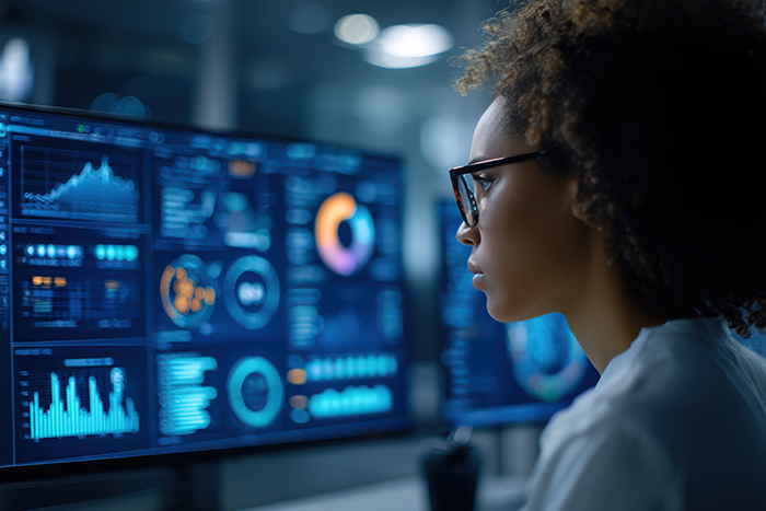 Female data scientist reviewing ai for patient access | Dash Voice AI